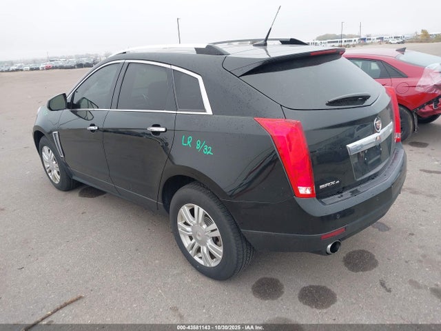2014 CADILLAC SRX 3GYFNEE38ES673091 Photo 2