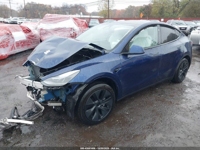 2024 TESLA MODEL Y 7SAYGAEE5RF200351 Photo 1