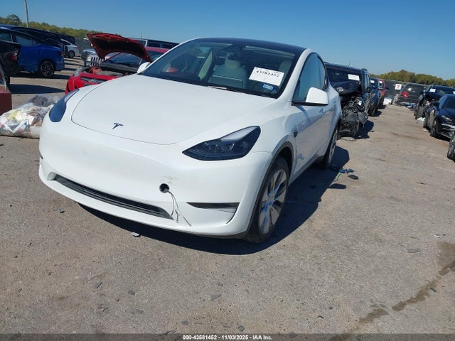 2024 TESLA MODEL Y 7SAYGDEE4RA267781 Photo 1