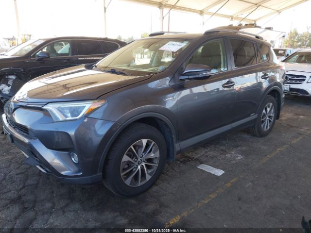 2018 TOYOTA RAV4 HYBRID JTMRJREV4JD163077 Photo 1