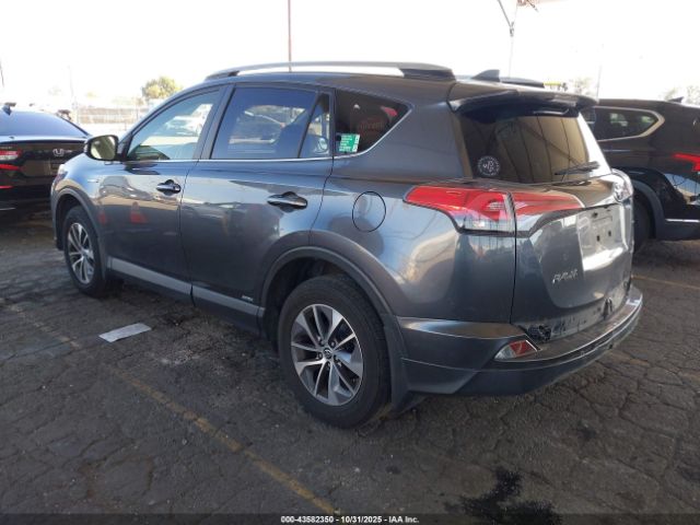 2018 TOYOTA RAV4 HYBRID JTMRJREV4JD163077 Photo 2