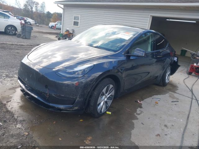 2024 TESLA MODEL Y 7SAYGDEE2RA280447 Photo 1