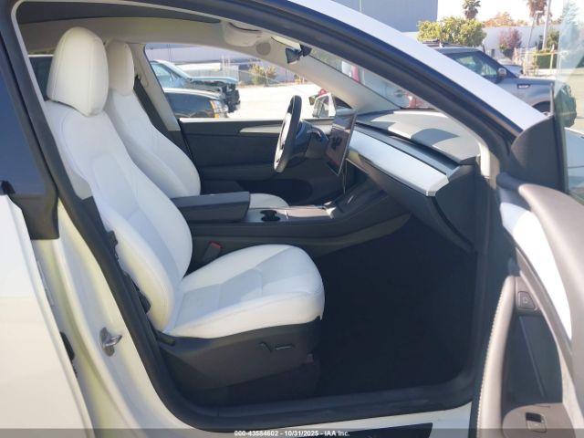2023 TESLA MODEL Y 7SAYGDEEXPF899328 Photo 4