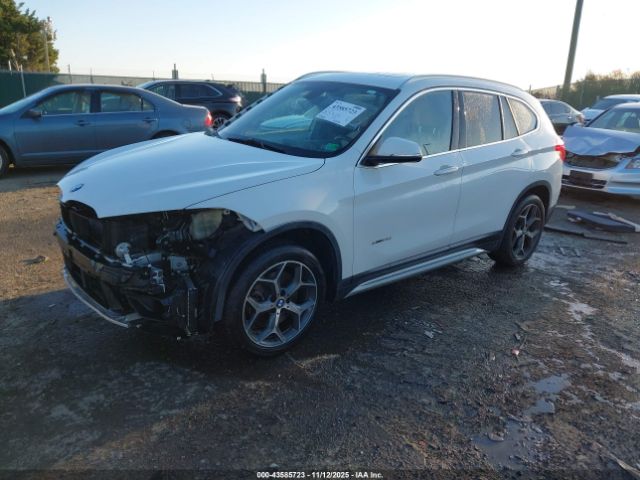 2018 BMW X1 WBXHT3Z36J4A66514 Photo 1