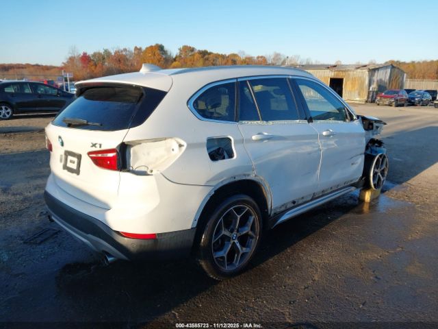 2018 BMW X1 WBXHT3Z36J4A66514 Photo 3