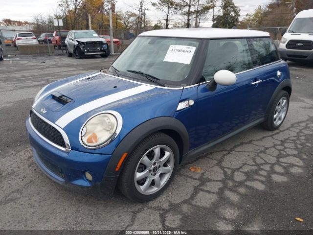 2009 MINI COOPER S WMWMF73589TT94677 Photo 1