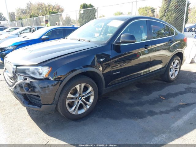 2015 BMW X4 5UXXW3C51F0F89334 Photo 1