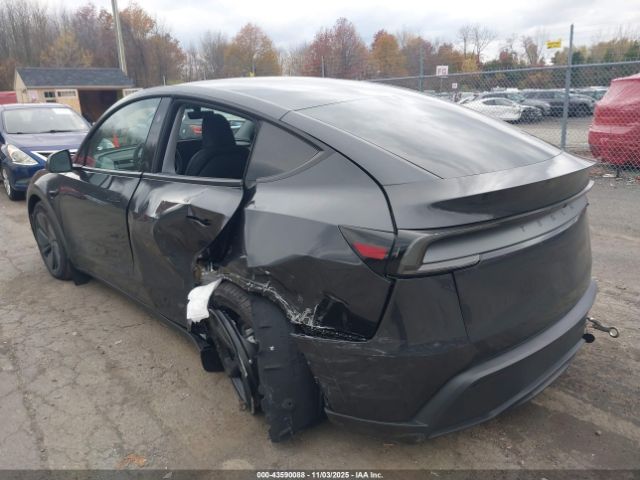 2026 TESLA MODEL Y 7SAYGDED4TF437624 Photo 2