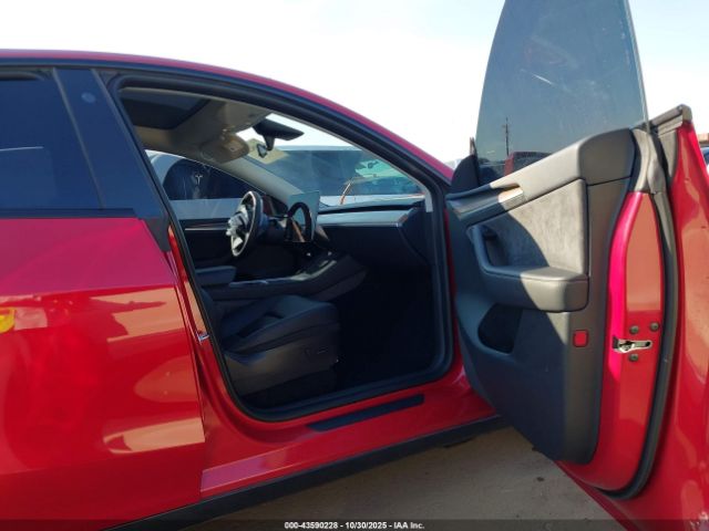 2023 TESLA MODEL Y 7SAYGDEE1PF668687 Photo 4