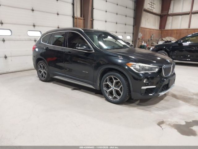 2016 BMW X1 WBXHT3C34G5E55910