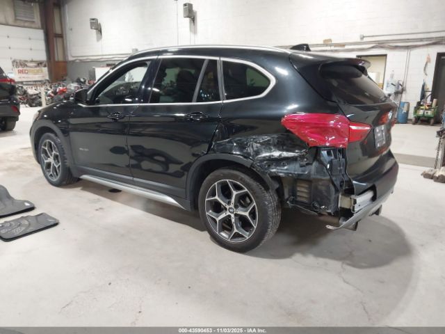 2016 BMW X1 WBXHT3C34G5E55910 Photo 2