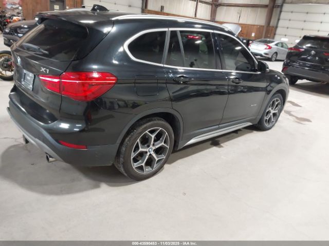 2016 BMW X1 WBXHT3C34G5E55910 Photo 3