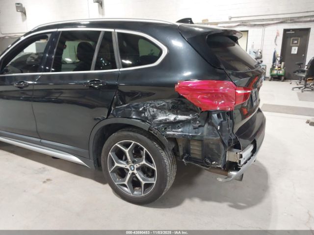 2016 BMW X1 WBXHT3C34G5E55910 Photo 5