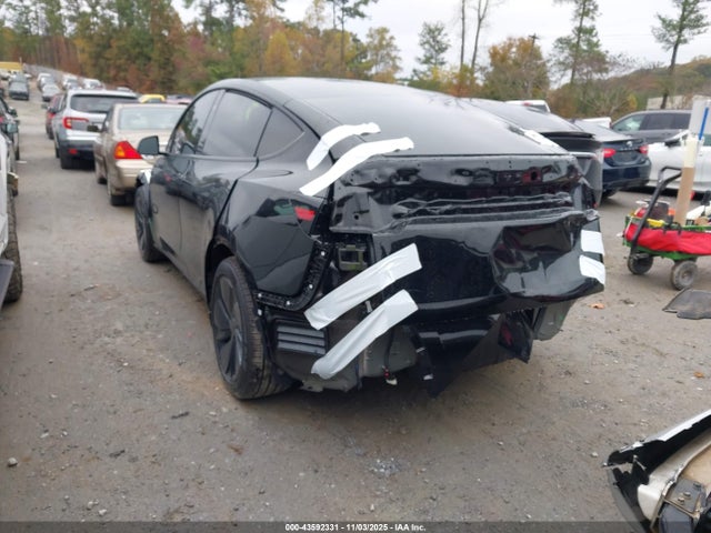 2026 TESLA MODEL Y 7SAYGDED3TA462009 Photo 2