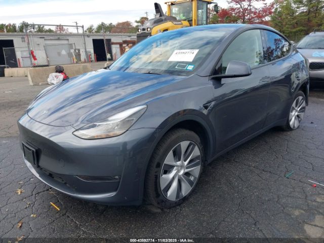 2023 TESLA MODEL Y 7SAYGDED6PF948385 Photo 1