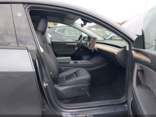 2023 TESLA MODEL Y 7SAYGDED6PF948385 Photo 4