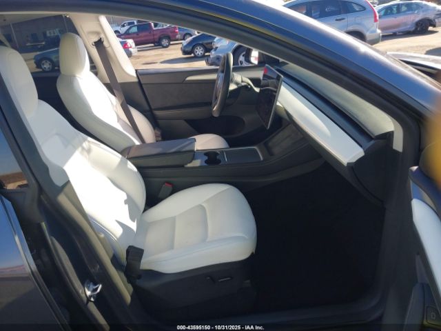 2023 TESLA MODEL Y 7SAYGDEF3PF864400 Photo 4