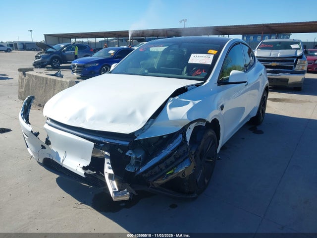 2026 TESLA MODEL Y 7SAYGDEE8TA390720 Photo 1