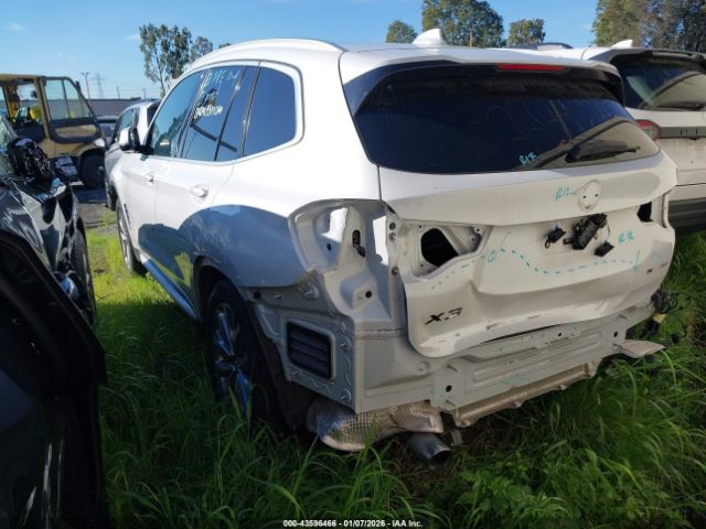 2019 BMW X3 5UXTR7C51KLF23789 Photo 2