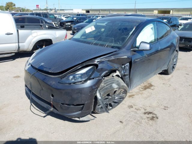 2024 TESLA MODEL Y 7SAYGDEF2RA311205 Photo 1