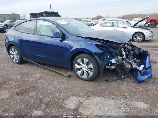 2023 TESLA MODEL Y 7SAYGDEE8PA121641 Photo 0