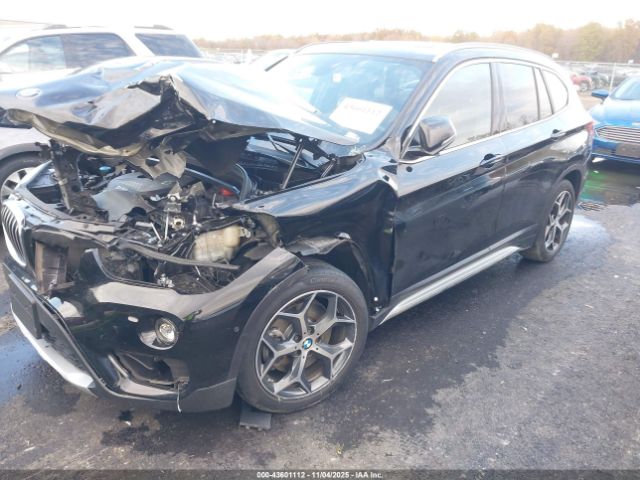 2018 BMW X1 WBXHT3C32J5L30876 Photo 1