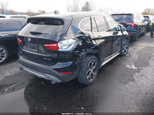 2018 BMW X1 WBXHT3C32J5L30876 Photo 3