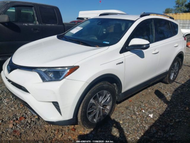 2018 TOYOTA RAV4 HYBRID JTMRJREV7JD190239 Photo 1