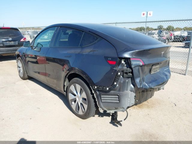 2024 TESLA MODEL Y 7SAYGDEE9RA248515 Photo 2