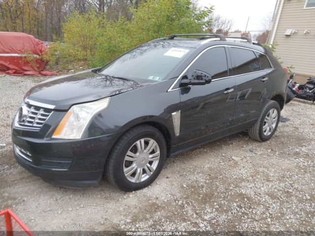 2015 CADILLAC SRX 3GYFNEE38FS604094 Photo 1