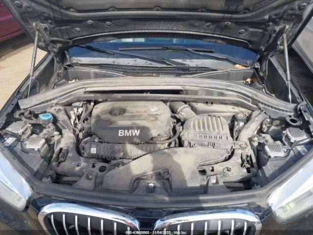 2017 BMW X1 WBXHT3C38H5F72360 Photo 9