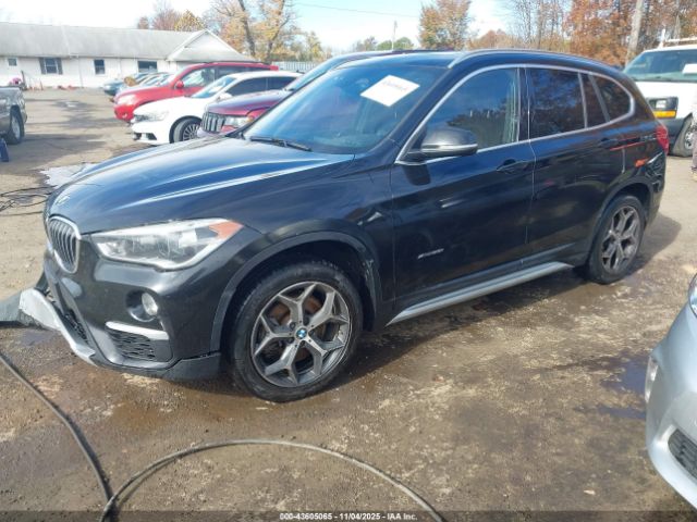 2017 BMW X1 WBXHT3C38H5F72360 Photo 1
