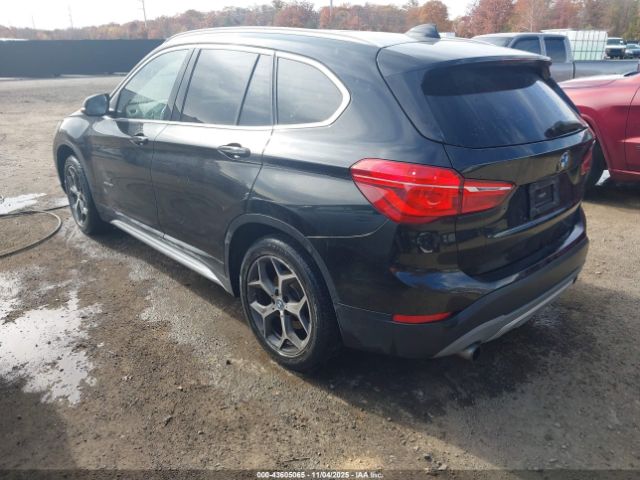 2017 BMW X1 WBXHT3C38H5F72360 Photo 2