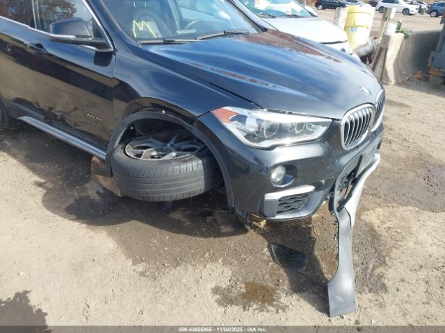 2017 BMW X1 WBXHT3C38H5F72360 Photo 5