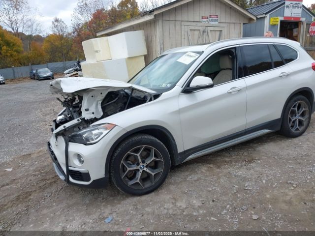 2018 BMW X1 WBXHT3C31J3H30443 Photo 1