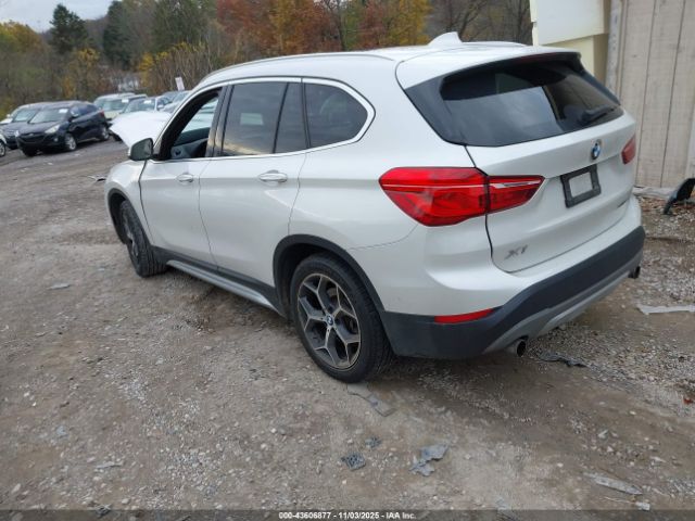 2018 BMW X1 WBXHT3C31J3H30443 Photo 2