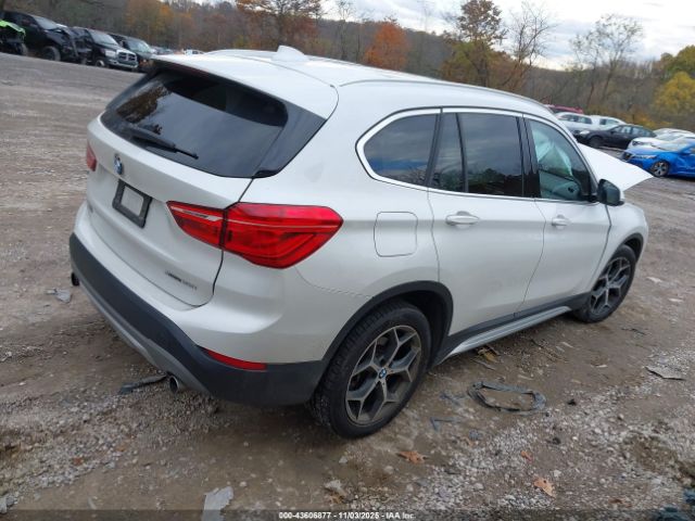 2018 BMW X1 WBXHT3C31J3H30443 Photo 3