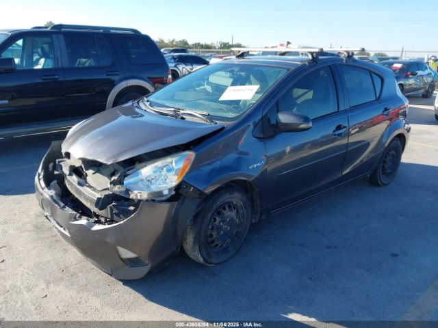 2012 TOYOTA PRIUS C JTDKDTB34C1526524 Photo 1