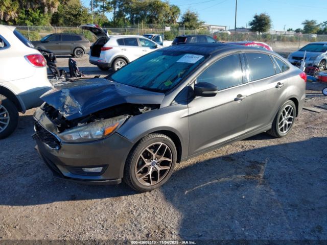 2018 FORD FOCUS 1FADP3H26JL234458 Photo 1