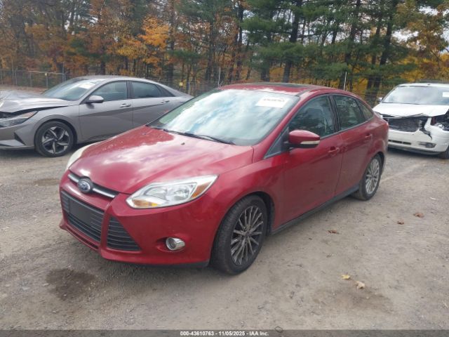 2014 FORD FOCUS 1FADP3F29EL397386 Photo 1