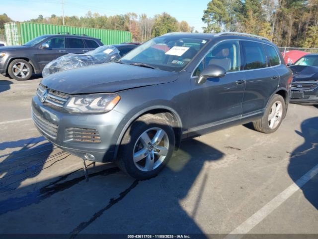 2011 VOLKSWAGEN TOUAREG WVGFK9BP5BD005852 Photo 1