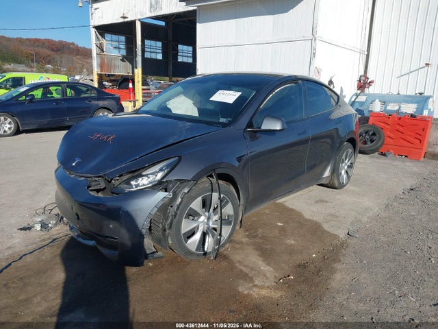 2023 TESLA MODEL Y 7SAYGAEE0PF582530 Photo 1