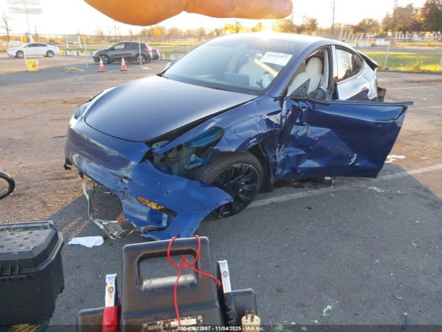 2023 TESLA MODEL Y 7SAYGAEE1PF845169 Photo 1