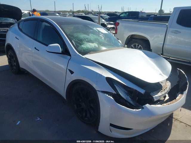 2023 TESLA MODEL Y 7SAYGDEE9PA076306 Photo 0