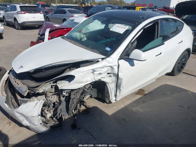 2023 TESLA MODEL Y 7SAYGDEE9PA076306 Photo 1