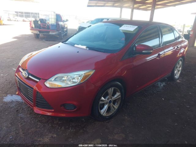 2014 FORD FOCUS 1FADP3F25EL413843 Photo 1
