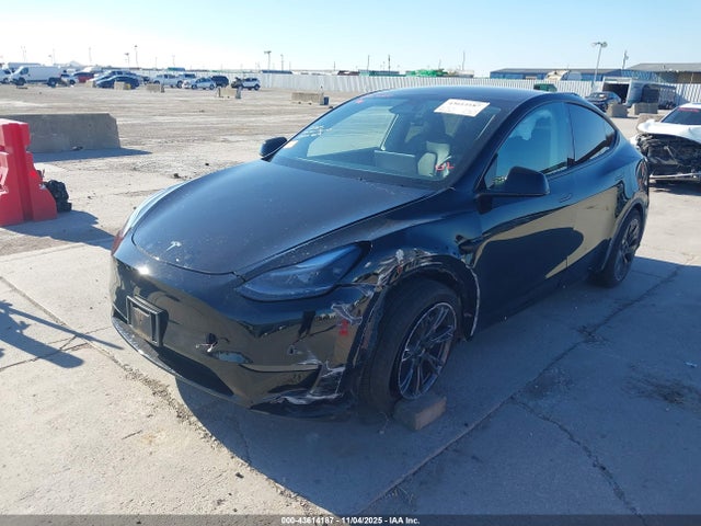 2024 TESLA MODEL Y 7SAYGAEE9RF194568 Photo 1