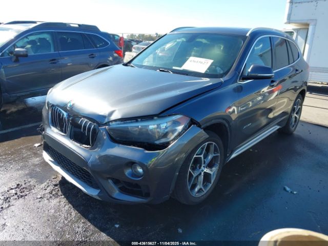 2018 BMW X1 WBXHT3C32J5F88575 Photo 1