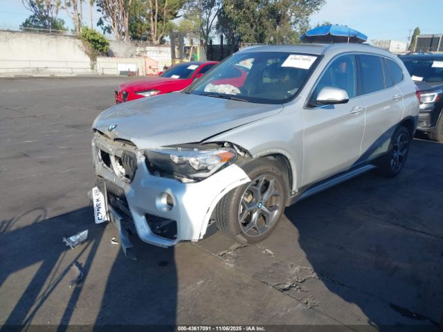 2018 BMW X1 WBXHU7C38J5L09275 Photo 1