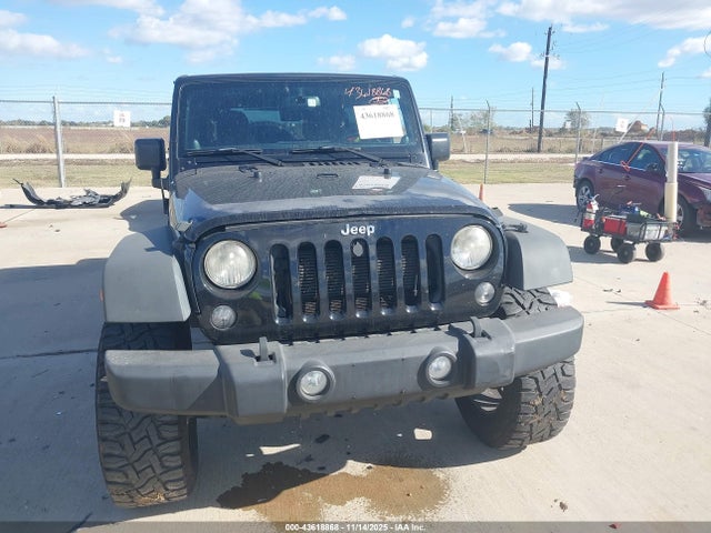 1C4BJWDG0EL311725 Jeep Wrangler Unlimited Sport
